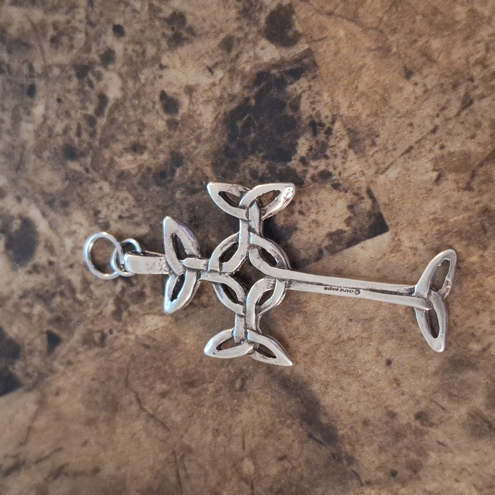 Copyright Celtic magic stamped cross pendent